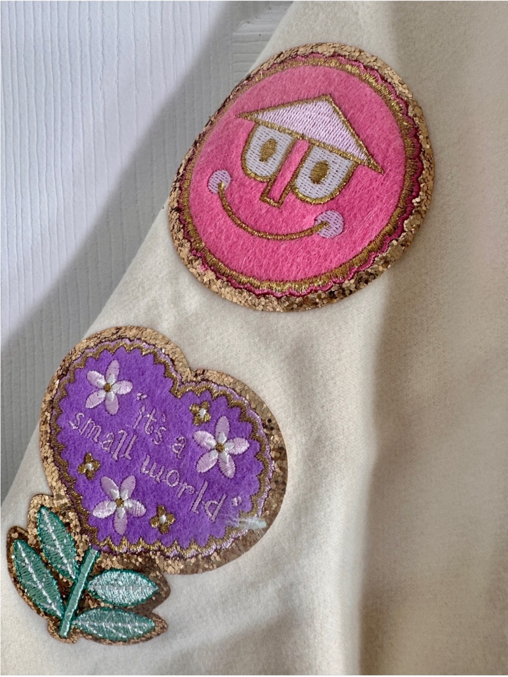 Stoney Clover Lane X Disney Parks 'It's A Small World' Mint Cream Varsity Jacket — image 7 of 8